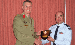 Australian Defence Force Cadet, Reserve and Employer Support Division chief of staff Colonel Tim Grutzner (left) with Prince of Wales Award winner Flight Lieutenant Geoffrey McDougall.